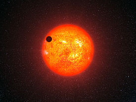 This artist's impression shows how GJ 1214 b may look as it transits its parent star. It is the second super-Earth for which astronomers have determined the mass and radius, giving vital clues about its structure.